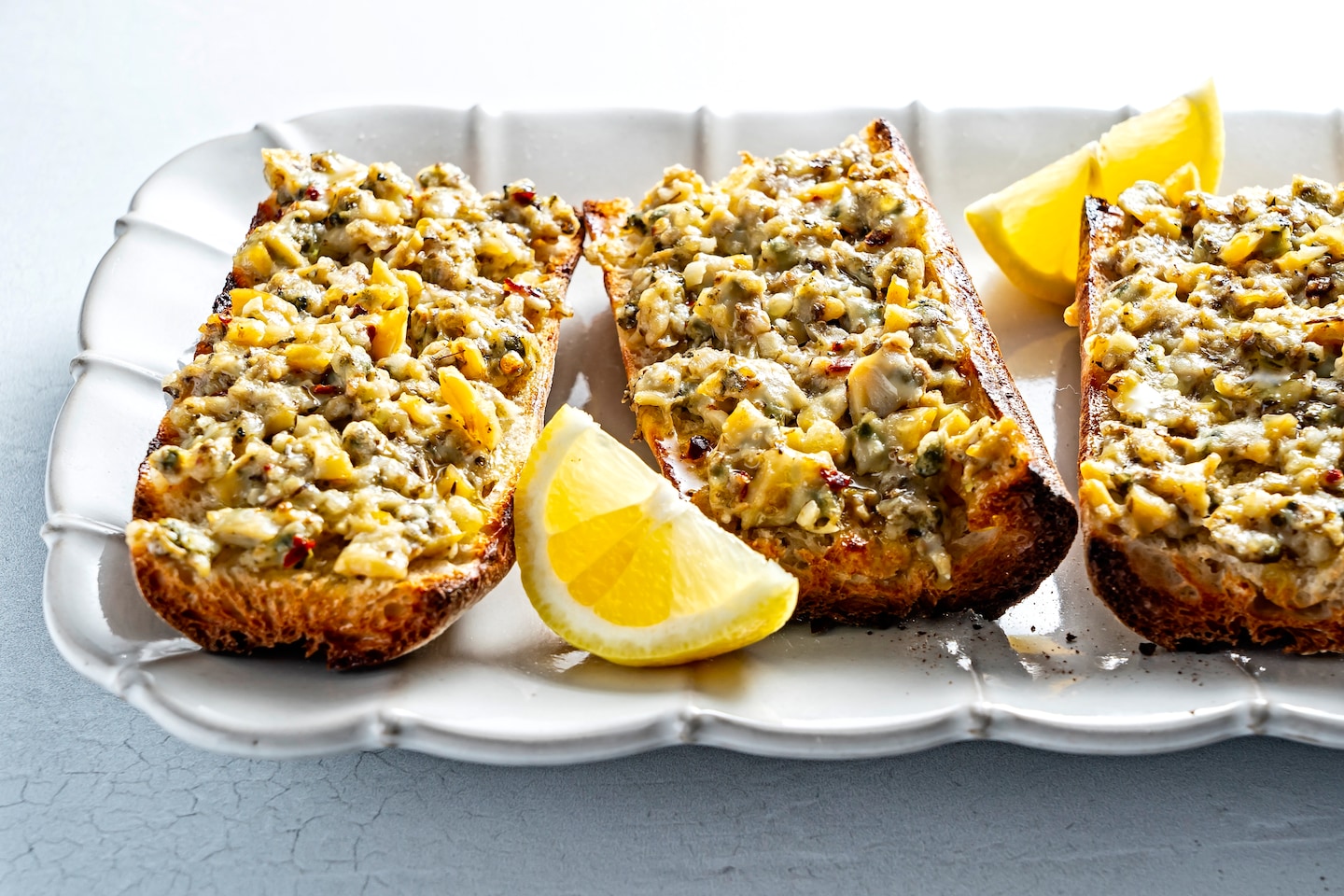 Cette recette de pizza aux palourdes prend 10 minutes et est un avant-goût du Connecticut